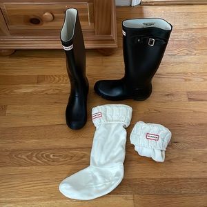 Black knee high HUNTER boots.